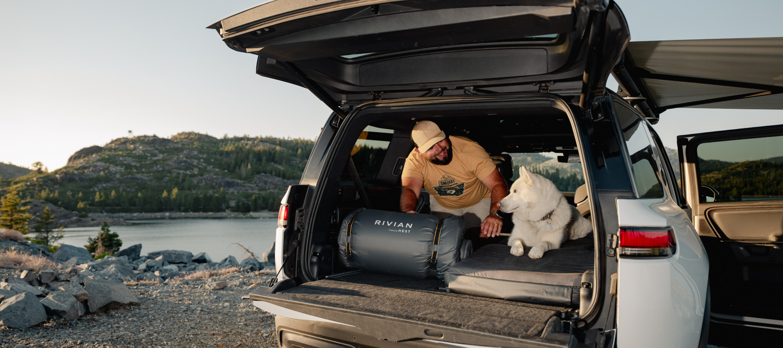 SUV set up for car camping with a HEST memory foam mattress designed for comfortable sleep during any camping adventure